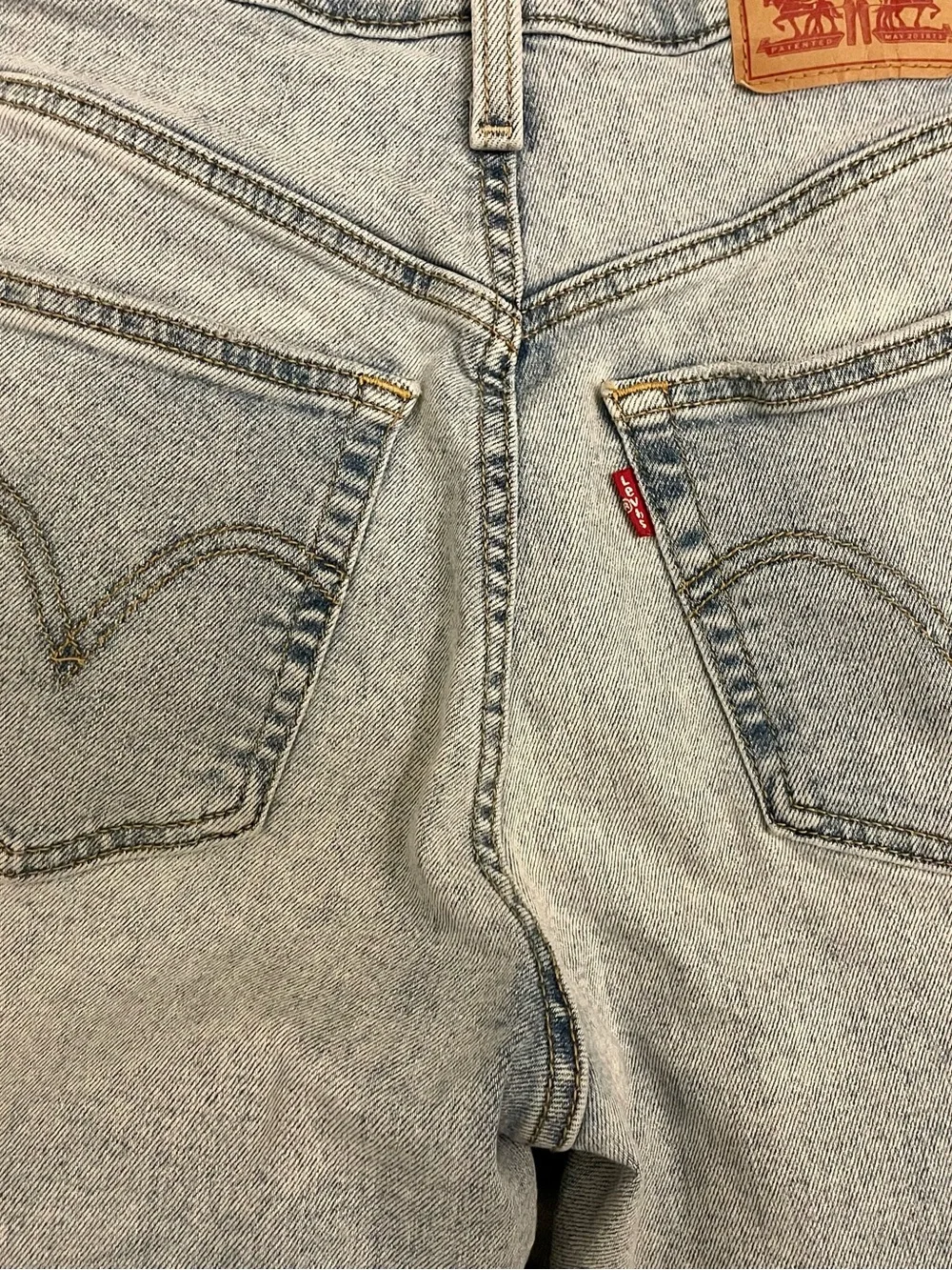 Levi's High-Rise Light Blue Distressed Straight Jeans
